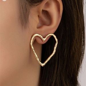 HEART SKIPPED A BEAT HAMMERED GOLD DELICATE HEART SHAPED MINIMALIST EARRINGS
